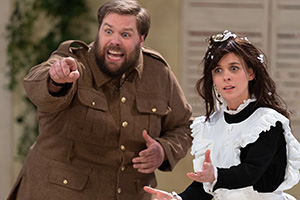 The Goes Wrong Show. Image shows from L to R: Robert (Henry Lewis), Sandra (Charlie Russell)