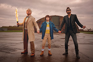 Good Omens. Image shows from L to R: Aziraphale (Michael Sheen), Adam Young (Sam Taylor Buck), Crowley (David Tennant)