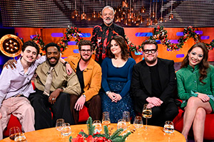 The Graham Norton Show. Image shows left to right: Timothée Chalamet, Colman Domingo, Andrew Garfield, Graham Norton, Ruth Jones, James Corden, Laufey Haraldsdóttir