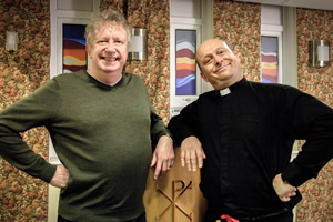 Hospital People. Image shows from L to R: Tony Jackson (Mark Williams), Father Kenny (Tom Binns). Copyright: Roughcut Television