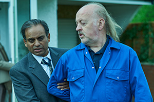 In The Long Run. Image shows from L to R: Rajesh (Neil D'Souza), Bagpipes (Bill Bailey)