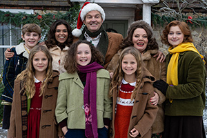 The Larkins. Image shows from L to R: Montgomery Larkin (Liam Middleton), Zinnia Larkin (Davina Coleman), Mariette Larkin (Sabrina Bartlett), Victoria Larkin (Lola Shepelev), Pop Larkin (Bradley Walsh), Petunia Larkin (Rosie Coleman), Ma Larkin (Joanna Scanlan), Primrose Larkin (Lydia Page)