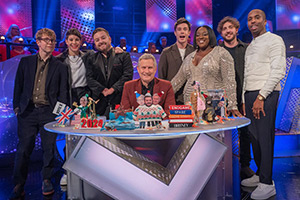 The Last Leg. Image shows left to right: Josh Widdicombe, Suzi Ruffell, Alex Brooker, Adam Hills, Ed Gamble, Judi Love, Seann Walsh, Kiell Smith-Bynoe