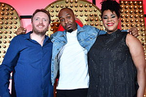 Live At The Apollo. Image shows from L to R: Chris McCausland, Dane Baptiste, Desiree Burch. Copyright: Open Mike Productions