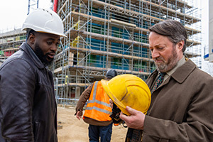 Ludwig. Image shows left to right: DI Russell Carter (Dipo Ola), John 'Ludwig' Taylor (David Mitchell)