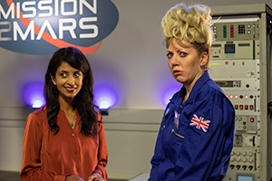 Mandy. Image shows from L to R: Konnie Huq, Mandy (Diane Morgan)