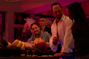 Maxxx. Image shows from L to R: Rose (Helen Monks), Don Wild (Christopher Meloni), Tamzin (Pippa Bennett-Warner)