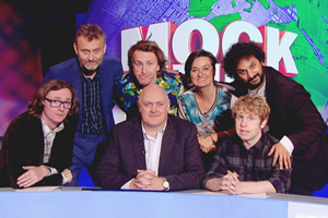 Mock The Week. Image shows from L to R: Ed Byrne, Hugh Dennis, Milton Jones, Dara O Briain, Zoe Lyons, Josh Widdicombe, Nish Kumar. Copyright: Angst Productions