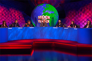 Mock The Week. Image shows from L to R: Angela Barnes, Hugh Dennis, Milton Jones, Dara O Briain, Kae Kurd, Maisie Adam, Ed Byrne. Copyright: Angst Productions