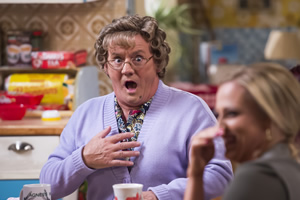 Mrs. Brown's Boys. Image shows from L to R: Agnes Brown (Brendan O'Carroll), Betty Brown (Amanda Woods)