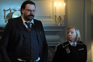 Murder In Successville. Image shows from L to R: DI Sleet (Tom Davis), Deborah Meaden. Copyright: Tiger Aspect Productions