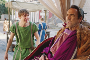 Plebs. Image shows from L to R: Marcus (Tom Rosenthal), Crassus (Robert Lindsay). Copyright: RISE Films