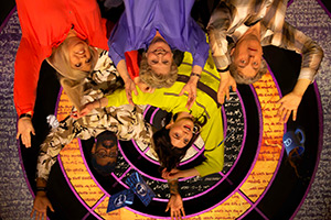 QI. Image shows left to right: Urzila Carlson, Romesh Ranganathan, Sandi Toksvig, Aisling Bea, Alan Davies