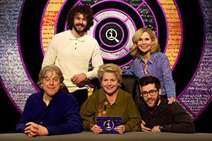 QI. Image shows left to right: Alan Davies, Josh Pugh, Sandi Toksvig, Sally Phillips, Aaron Simmonds