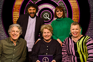 QI. Image shows left to right: Alan Davies, Nish Kumar, Sandi Toksvig, Cally Beaton, Laura Smyth