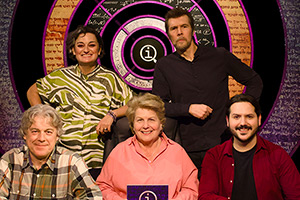 QI. Image shows left to right: Alan Davies, Zoe Lyons, Sandi Toksvig, Rhod Gilbert, Ignacio Lopez