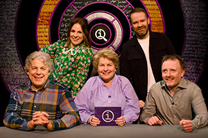 QI. Image shows left to right: Alan Davies, Cariad Lloyd, Sandi Toksvig, Neil Delamere, Chris McCausland