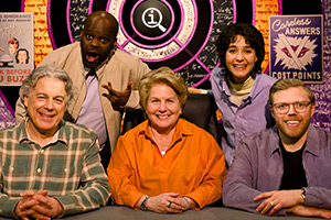 QI. Image shows left to right: Alan Davies, Daliso Chaponda, Sandi Toksvig, Lara Ricote, Rob Beckett