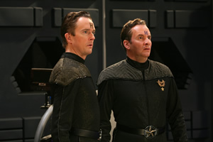 Red Dwarf. Image shows from L to R: Howard Rimmer (Mark Dexter), Rimmer (Chris Barrie). Copyright: UKTV