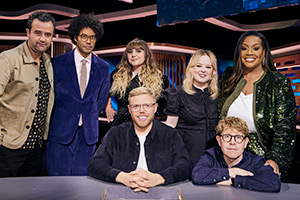 Rob Beckett's Smart TV. Image shows left to right: Roman Kemp, Alison Hammond, Rob Beckett, Natasia Demetriou, Kiell Smith-Bynoe, Josh Widdicombe, David Morrissey