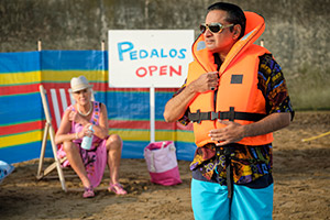 Sandylands. Image shows from L to R: Pedalo Pat (Janet Prince), Les Vegas (Sanjeev Bhaskar). Copyright: King Bert Productions