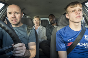 Sick Of It. Image shows from L to R: Karl (Karl Pilkington), Zoe (Kate Ashfield), Gregg (Emmanuel Ighodaro), Dylan (Finn Bennett)