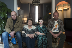 Sick Of It. Image shows from L to R: Karl (Karl Pilkington), Rhonda (Stephanie Fayerman), Ruby (Marama Corlett), Eddie (Doug Stanhope)