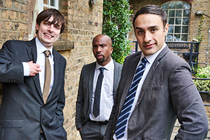 Stath Lets Flats. Image shows from L to R: Al (Alastair Roberts), Dean (Kiell Smith-Bynoe), Stath (Jamie Demetriou). Copyright: Roughcut Television