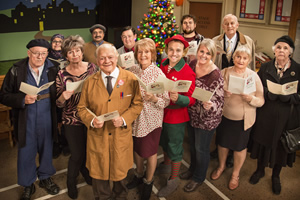 Still Open All Hours. Image shows from L to R: Gastric (Tim Healy), Mrs Hussein (Nina Wadia), Madge (Brigit Forsyth), Cyril (Kulvinder Ghir), Granville (David Jason), Wet Eric (Johnny Vegas), Mavis (Maggie Ollerenshaw), Leroy (James Baxter), Boyfriend (Matthew Mellalieu), Kath Agnew (Sally Lindsay), Mr Newbold (Geoffrey Whitehead), Elsie Bridges (Janine Duvitski), Mrs Featherstone (Stephanie Cole). Copyright: BBC