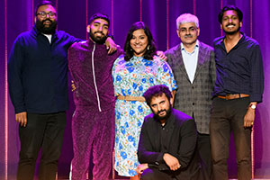 The Big Asian Stand-Up. Image shows from L to R: Sunil Patel, Mawaan Rizwan, Sukh Ojla, Nish Kumar, Mark Silcox, Ahir Shah. Copyright: BBC