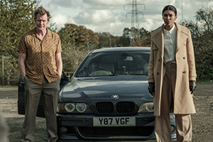 Two Weeks To Live. Image shows from L to R: Brooks (Jason Flemyng), Thompson (Thalissa Teixeira). Copyright: Kudos Productions