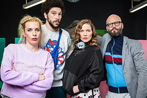 W1A. Image shows from L to R: Coco Lomax (Sara Pascoe), Karl Marx (Joel Fry), Siobhan Sharpe (Jessica Hynes), Barney Lumsden (Alex Beckett). Copyright: BBC