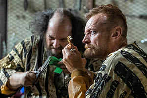 The Watch. Image shows from L to R: Urdo van Pew (Joe Vaz), Sam Vimes (Richard Dormer)