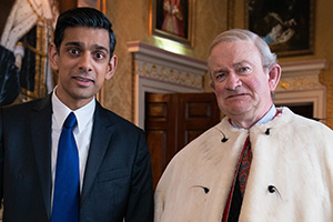 The Windsors. Image shows left to right: Rishi Sunak (Amit Shah), Charles (Harry Enfield)