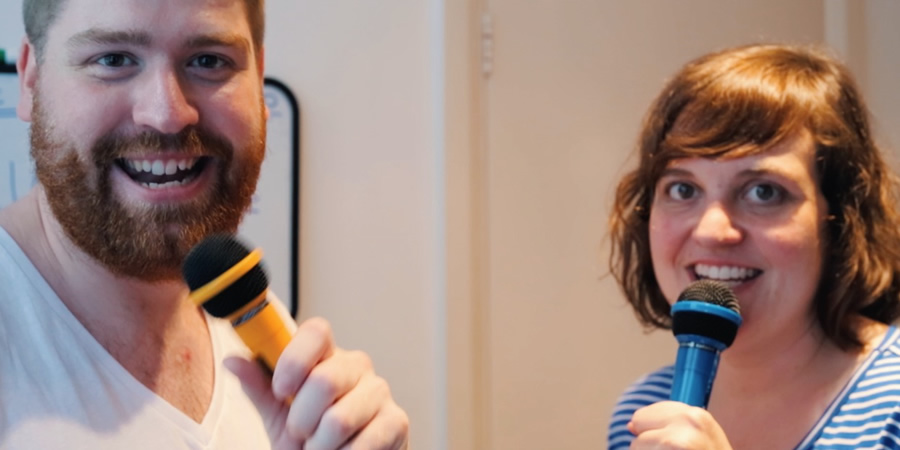 2 Standup Comedians Living In A Flat. Image shows from L to R: Will (William Sirl), Lyns (Lynsey Bonell)