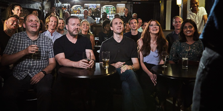 After Life. Image shows from L to R: Lenny (Tony Way), Tony (Ricky Gervais), Matt (Tom Basden), Kath (Diane Morgan), Sandy (Mandeep Dhillon). Copyright: Derek Productions