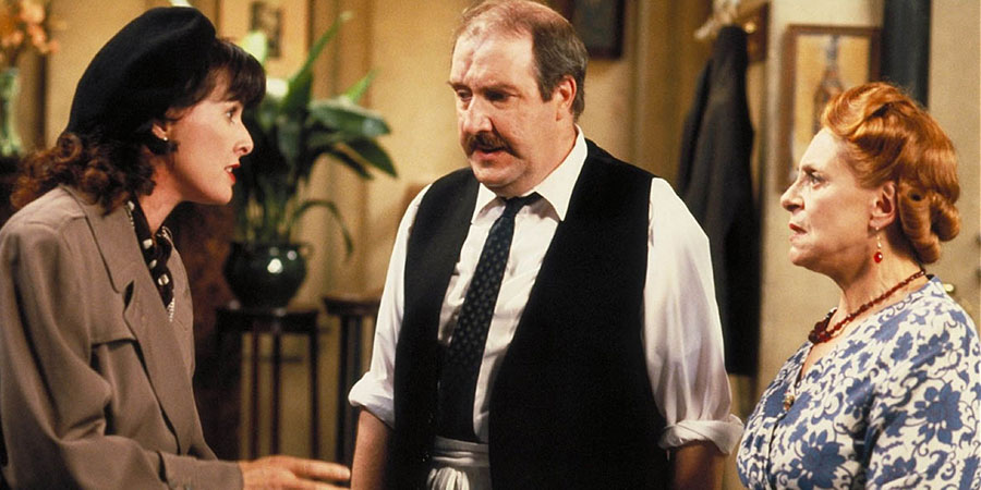 'Allo 'Allo!. Image shows left to right: Michelle Dubois (Kirsten Cooke), René François Artois (Gorden Kaye), Edith Melba Artois (Carmen Silvera). Credit: BBC