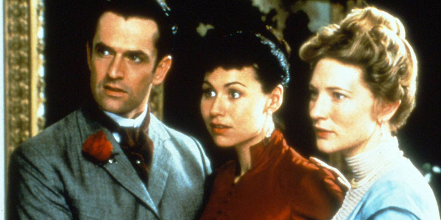 An Ideal Husband. Image shows from L to R: Lord Arthur Goring (Rupert Everett), Miss Mabel Charlton (Minnie Driver), Gertrude Charlton (Cate Blanchett). Copyright: Miramax Films