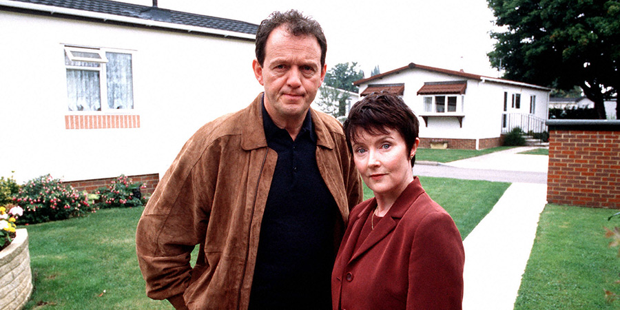 Auf Wiedersehen, Pet. Image shows left to right: Neville (Kevin Whately), Brenda Hope (Julia Tobin)