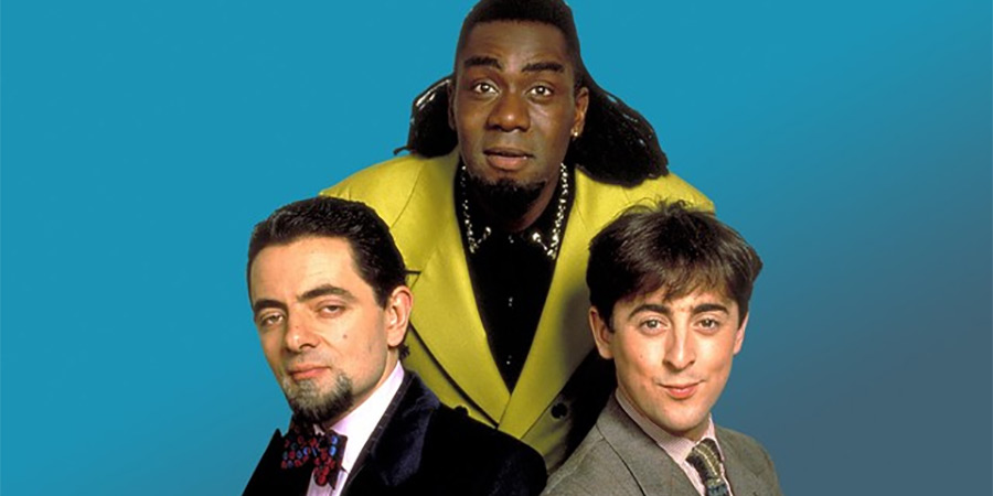 Bernard And The Genie. Image shows left to right: Boss (Rowan Atkinson), Genie (Lenny Henry), Bernard Bottle (Alan Cumming)