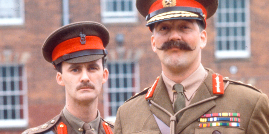 Blackadder. Image shows from L to R: Captain Kevin Darling (Tim McInnerny), General Melchett (Stephen Fry)