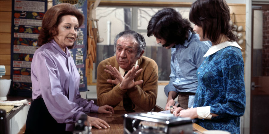 Bless This House. Image shows from L to R: Jean Abbott (Diana Coupland), Sid Abbott (Sid James), Mike Abbott (Robin Stewart), Sally Abbott (Sally Geeson). Copyright: Thames Television