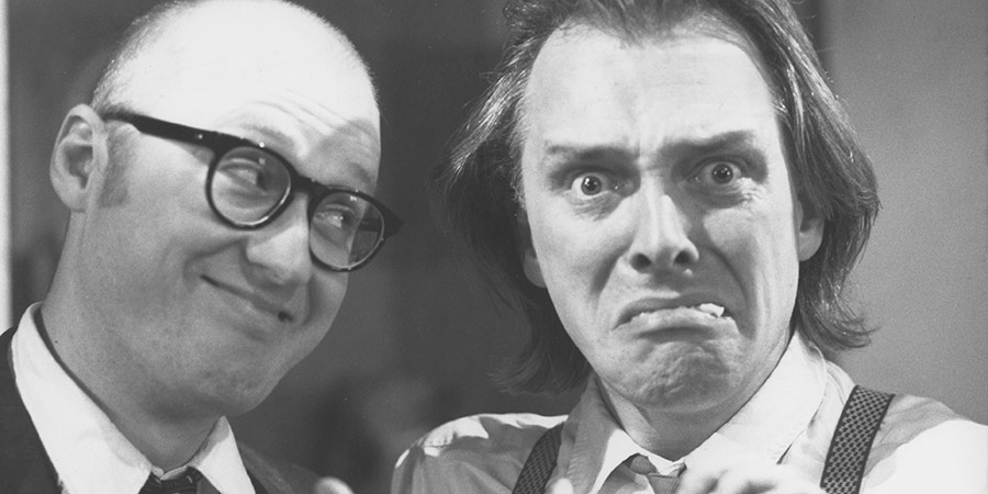 Bottom. Image shows from L to R: Eddie Hitler (Adrian Edmondson), Richie Richard (Rik Mayall). Copyright: BBC