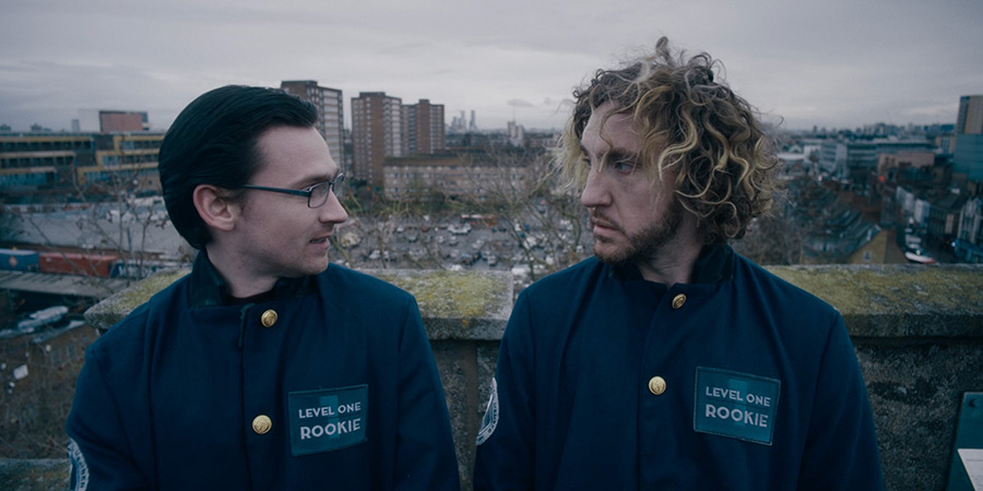 The Bystanders. Image shows left to right: Peter Weir (Scott Haran), Frank Baron (Seann Walsh)