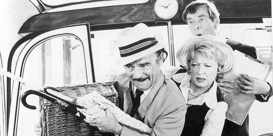 Carry On Abroad. Image shows left to right: Stanley Blunt (Kenneth Connor), Evelyn Blunt (June Whitfield), Stuart Farquhar (Kenneth Williams). Credit: STUDIOCANAL