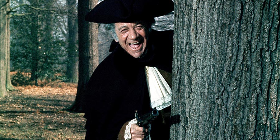 Carry On Dick. Richard 'Big Dick' Turpin / Reverend Flasher (Sid James). Copyright: Peter Rogers Productions