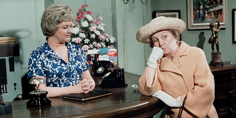 Carry On Girls. Image shows left to right: Connie Philpotts (Joan Sims), Mrs. Dukes (Joan Hickson). Credit: Rank Organisation, ITV