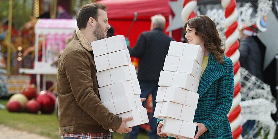 Christmas At The Holly Day Inn. Image shows left to right: Oliver Perry (Kevin Leslie), Emma Holly (Tamla Kari)