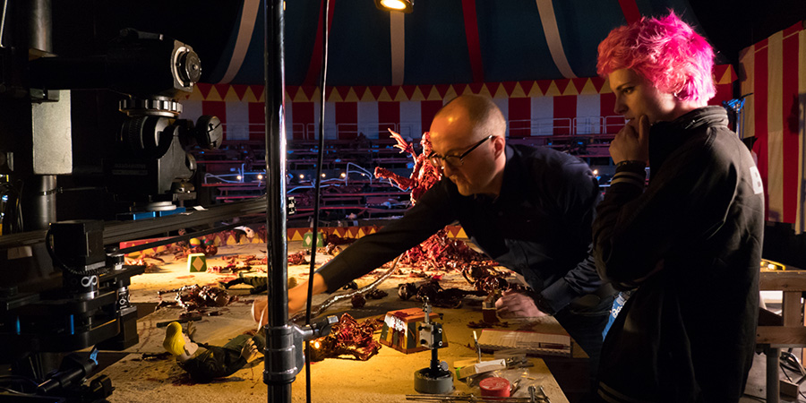 Mike and a member of the production team work on the aftermath of the finale battle sequence. Mike Mort