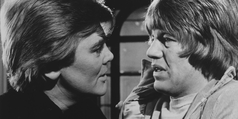 Confessions Of A Pop Performer. Image shows left to right: Sidney Noggett (Anthony Booth), Timothy Lea (Robin Askwith). Credit: Columbia Pictures